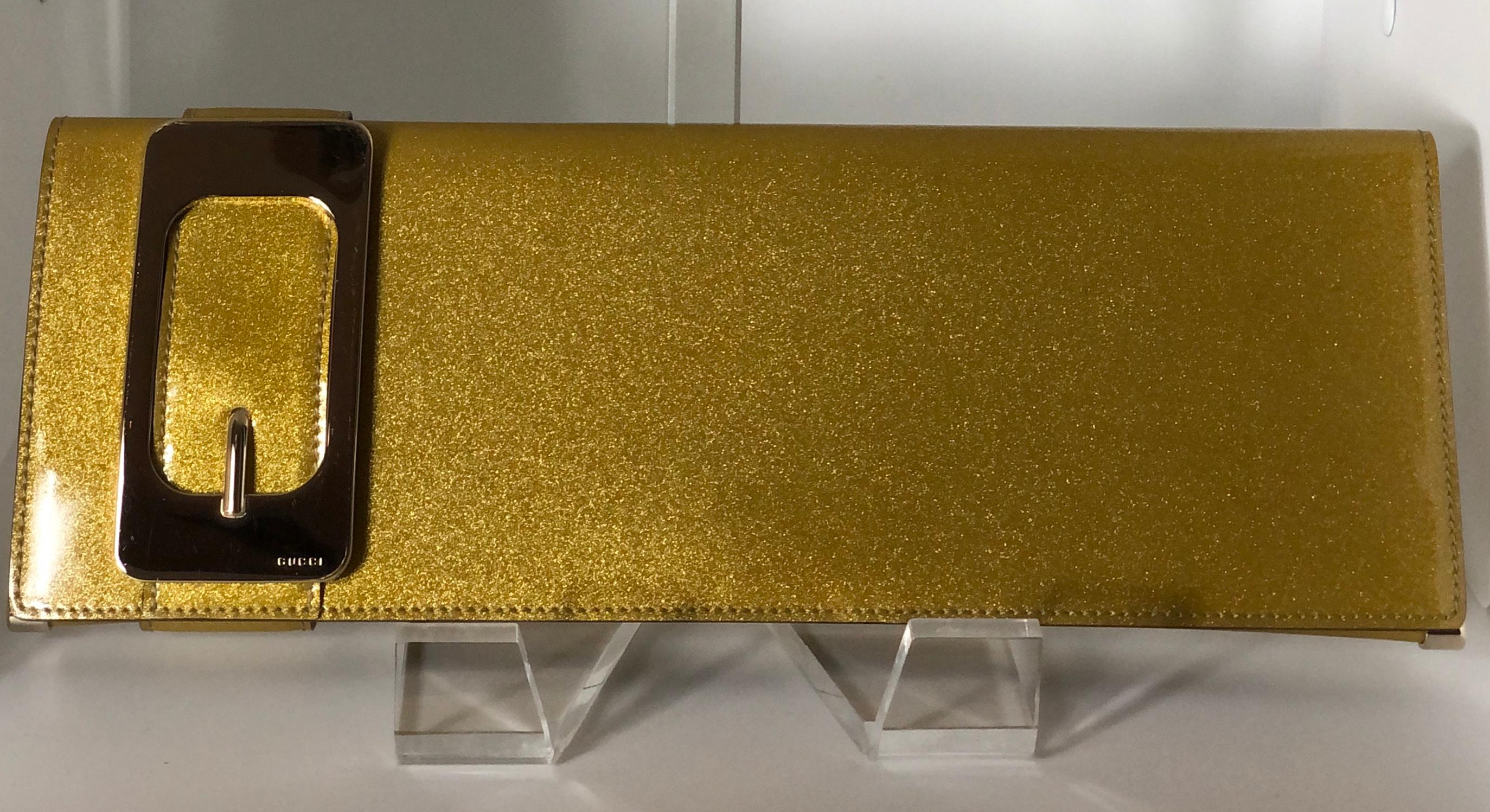 Brown Gucci Iridescent Gold Patent Leather Elongated Clutch with Gold Metal Accents For Sale