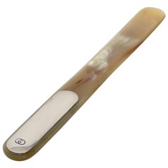 Tagliacarte Gucci in argento e corno