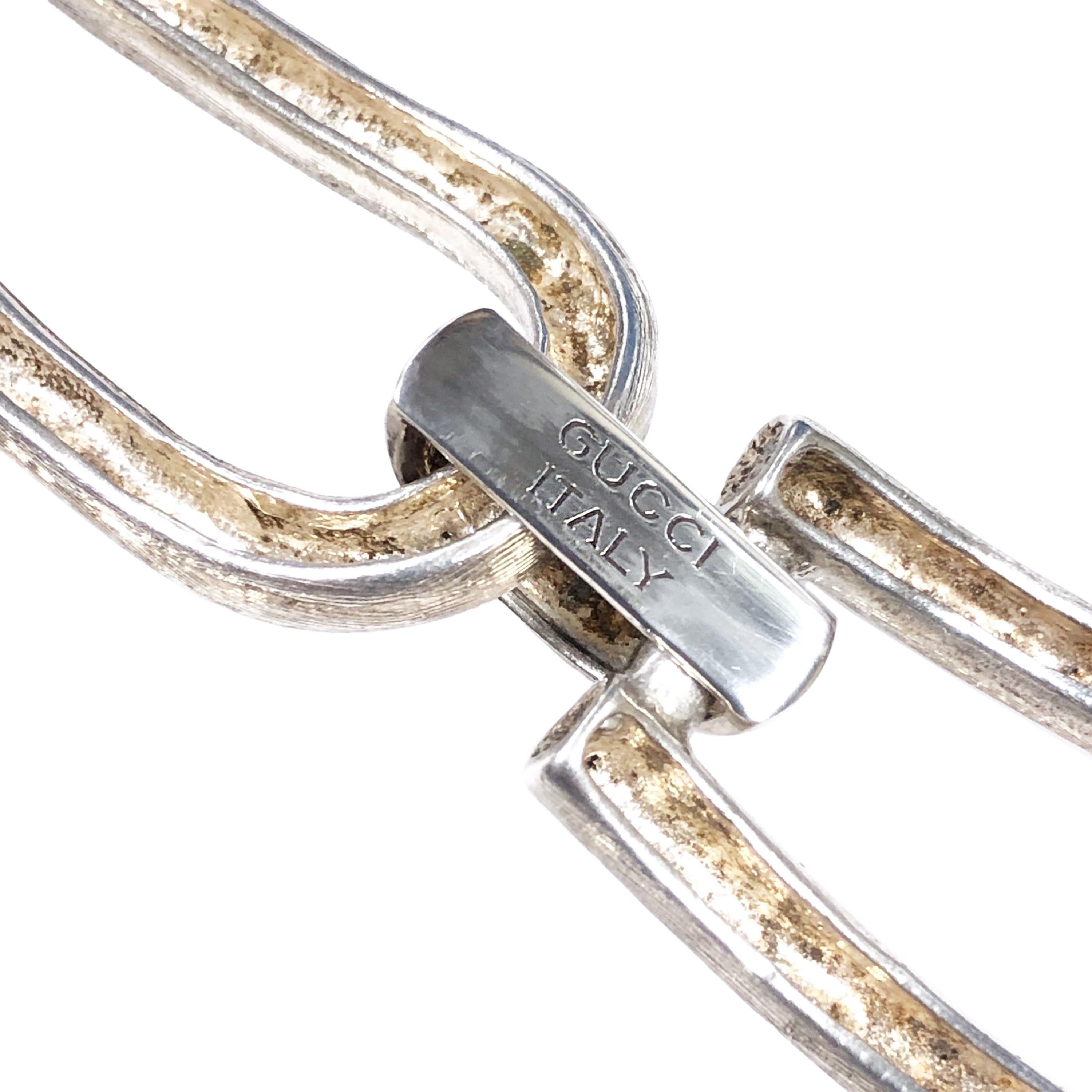 Circa 1960s Gucci Sterling Silver Link Bracelet, elongated Horse Shoe Shaped links measuring 7/8 inch wide and having a light brushed finish with the center links having a high polish for a nice contrast. The bracelet measures 7 1/2 inches in length.