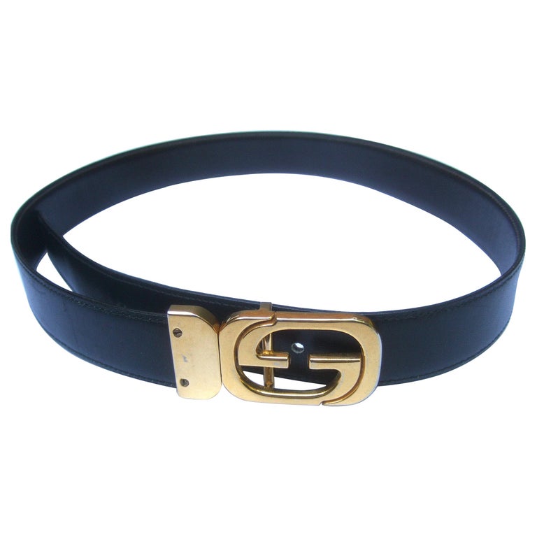 Gucci Italy Black and Brown Reversible Leather Unisex Belt c 1980s at  1stDibs | gucci belt italy, gucci fanny pack, ferragamo belt buckle