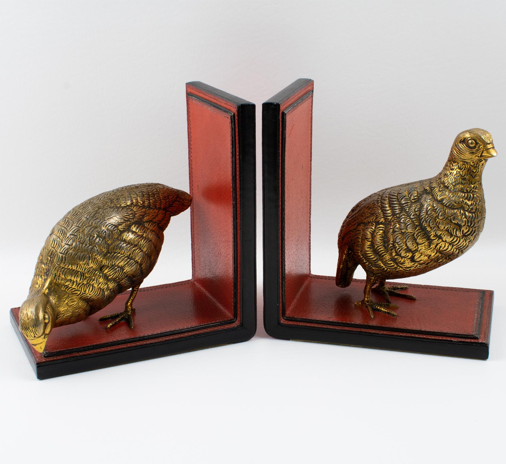 Gucci, Italy, designed this superb pair of handcrafted leather and metal bookends in the 1970s. This rare large-scale set features two gilded metal partridges resting on a hand-stitched leather 