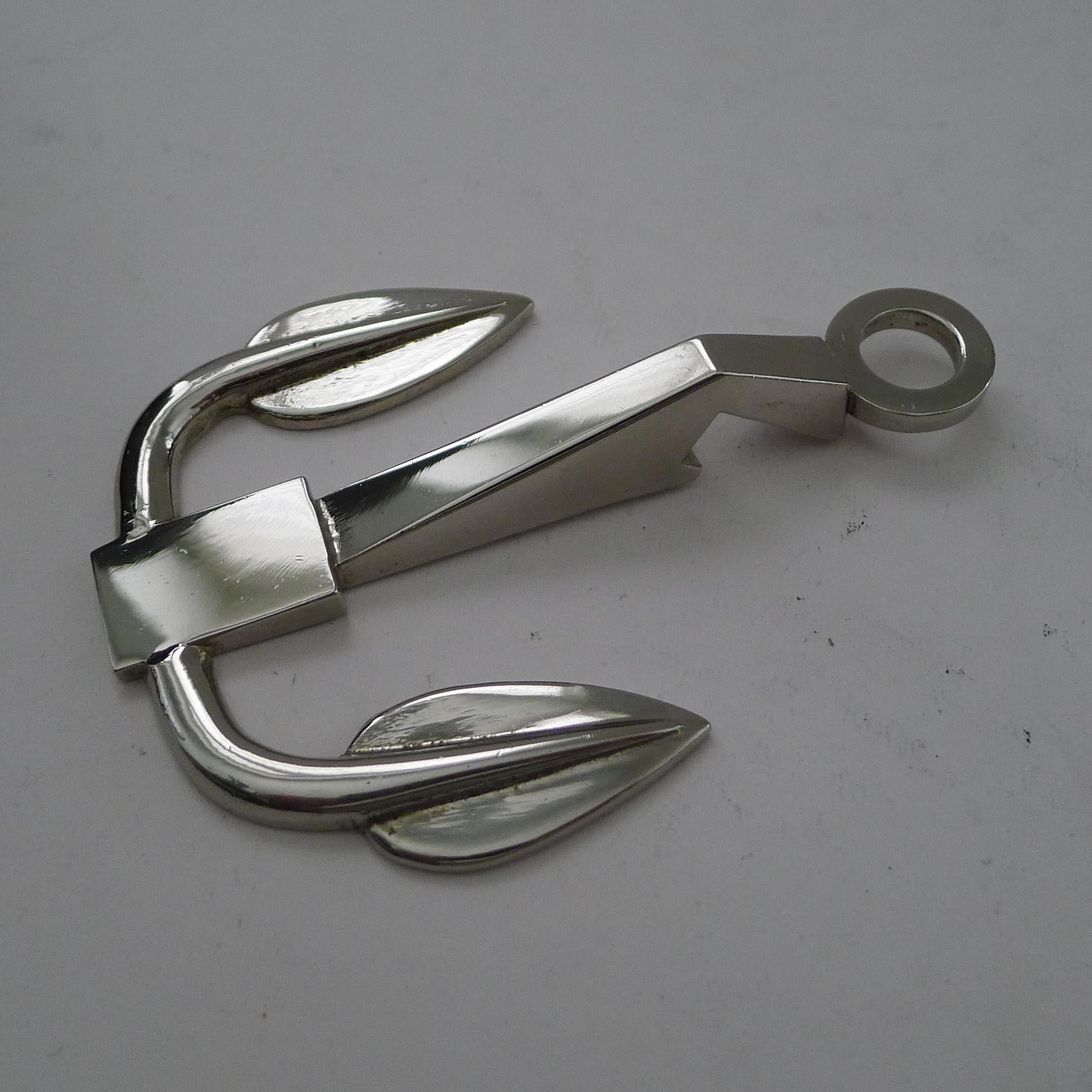 A rarely found Italian chromium bottle opener in the form of an anchor signed on the underside by 