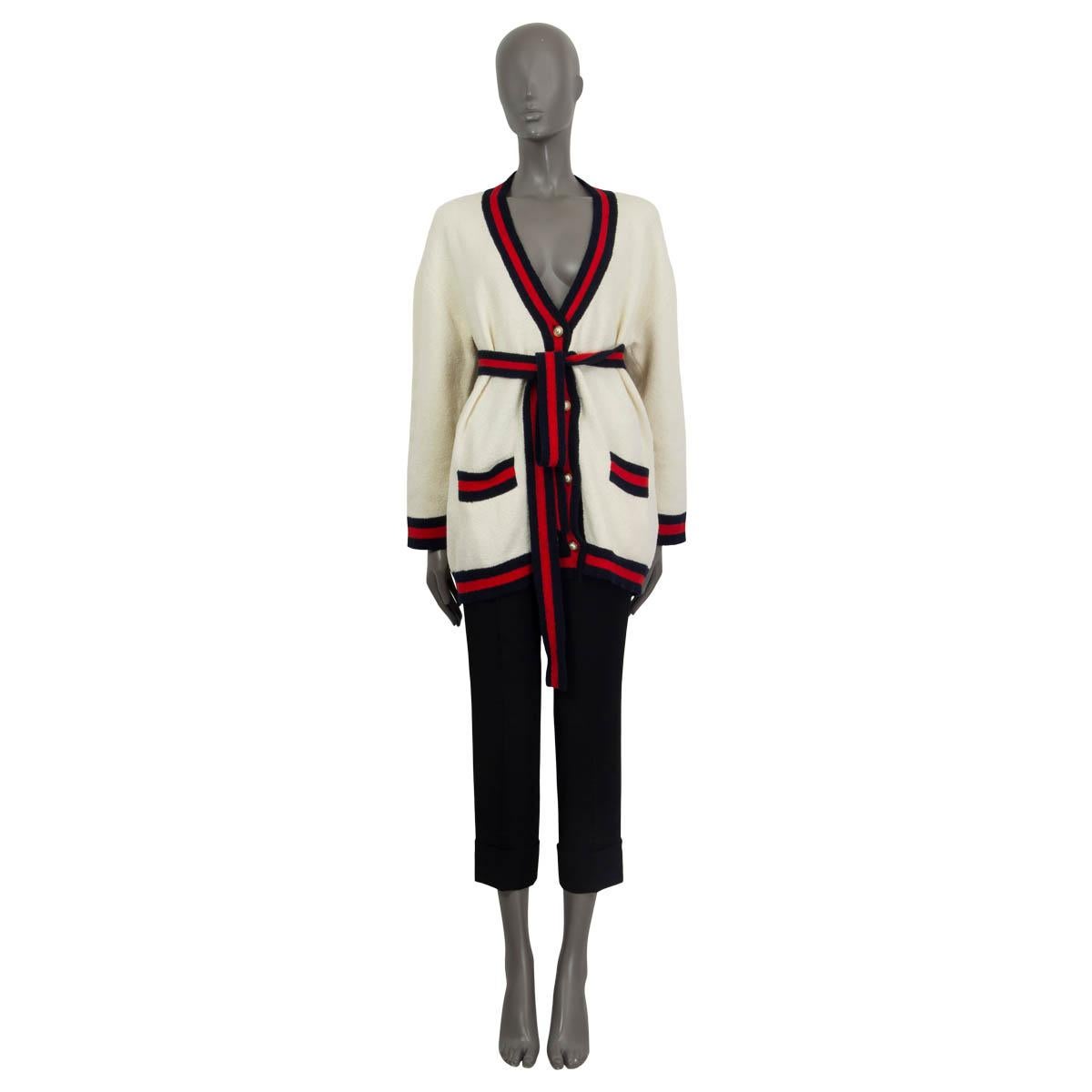 100% authentic Gucci oversized belted cardigan in off-white terry cloth cotton (75%), polyamide (24%) and elastane (1%) with signature Web in blue and red. Embroidered with 'Blind For Love' on the back. Embellished with GG faux pearl buttons and two