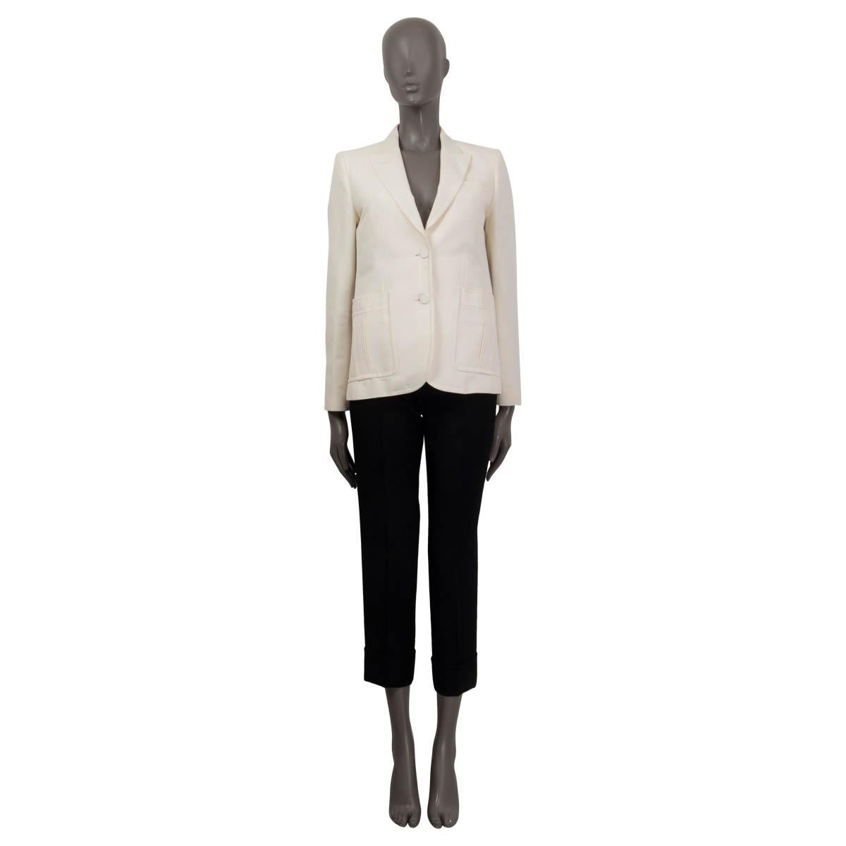 100% authentic Gucci classic single breasted blazer in ivory cotton (52%), polyamide (42%) and silk 86%). Features three pockets on the front and buttoned cuffs. Opens with two buttons on the front. Lined in ivory acetate (67%) and polyester (33%).