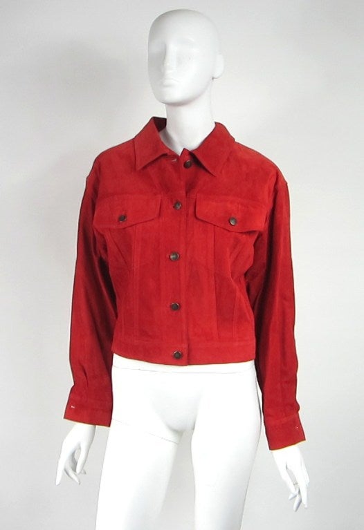 Cut like a Denim Jacket, however Red Suede Gucci. Unlined, Gucci on all metal Buttons. Our client purchased this and worn it once, stored away. 36 inch  bust - 21.5 inch sleeve- 19.5 inches long down the back.  This is out of a massive collection of