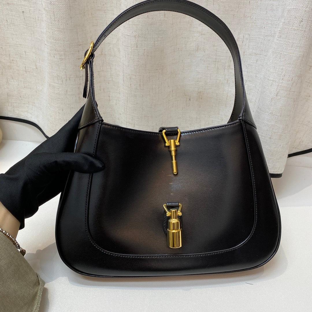 Gucci Jackie 1961 Black Leather Bag Small Piston Lock With Strap In Excellent Condition In AUBERVILLIERS, FR