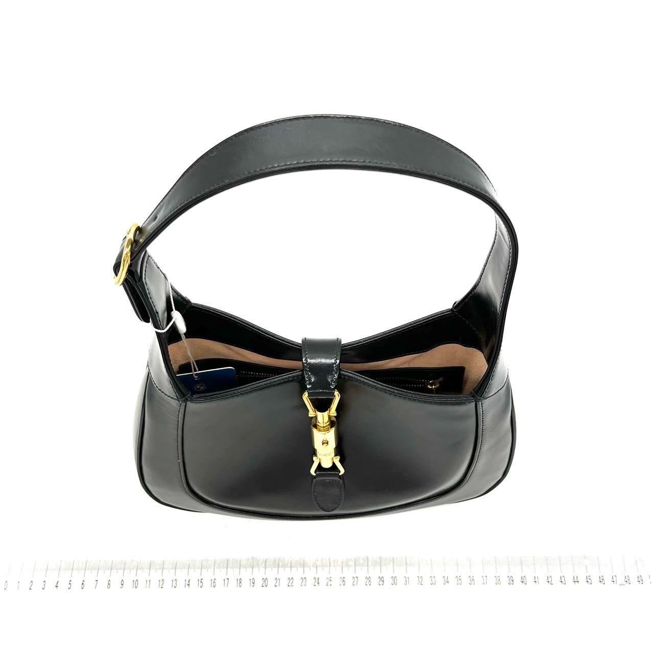 Gucci Jackie 1961 Black Leather Bag with Adjustable Strap In Excellent Condition In AUBERVILLIERS, FR