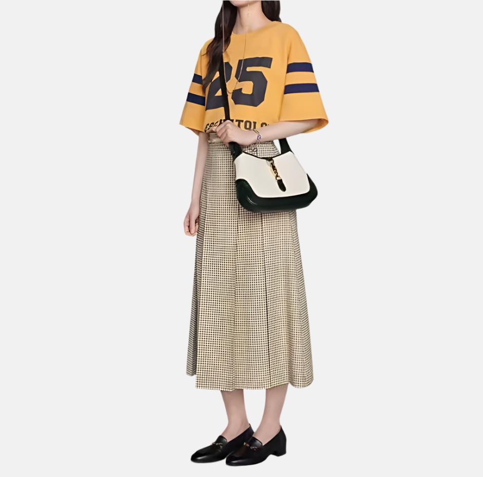 Gucci Jackie 1961 Black & White Leather Bag Small
 These are professional photos of the actual bag.
 The Gucci Jackie 1961 Handbag is a modern take on an iconic design. Crafted in black and white leather with a structured silhouette, it features a