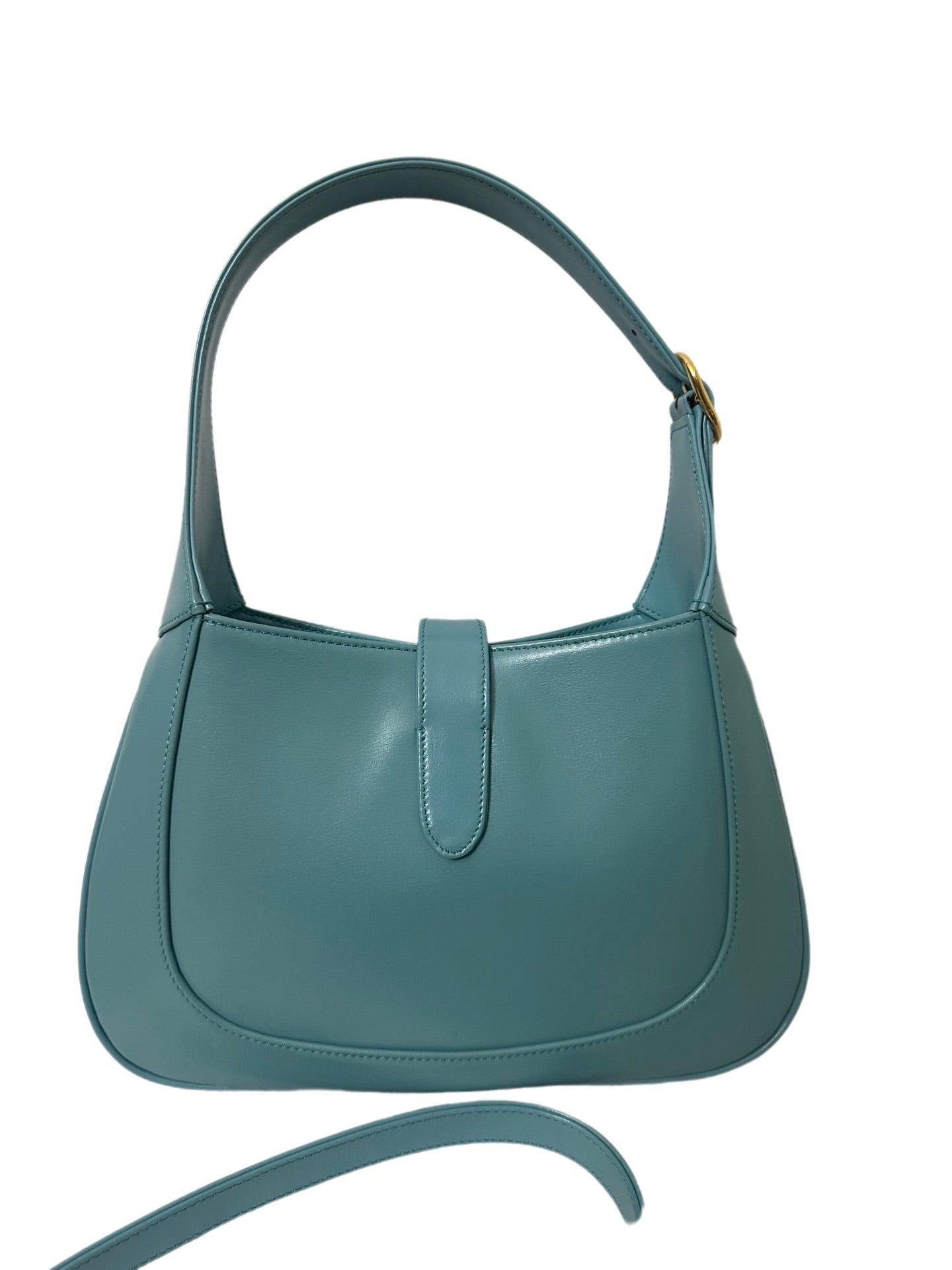Gucci Jackie 1961 Blue Small Shoulder Bag with Adjustable Strap
 These are professional photos of the actual bag offered by Luxbags.
 The Gucci Jackie 1961 Blue Small bag is a modern take on an iconic design. Crafted in leather with a structured