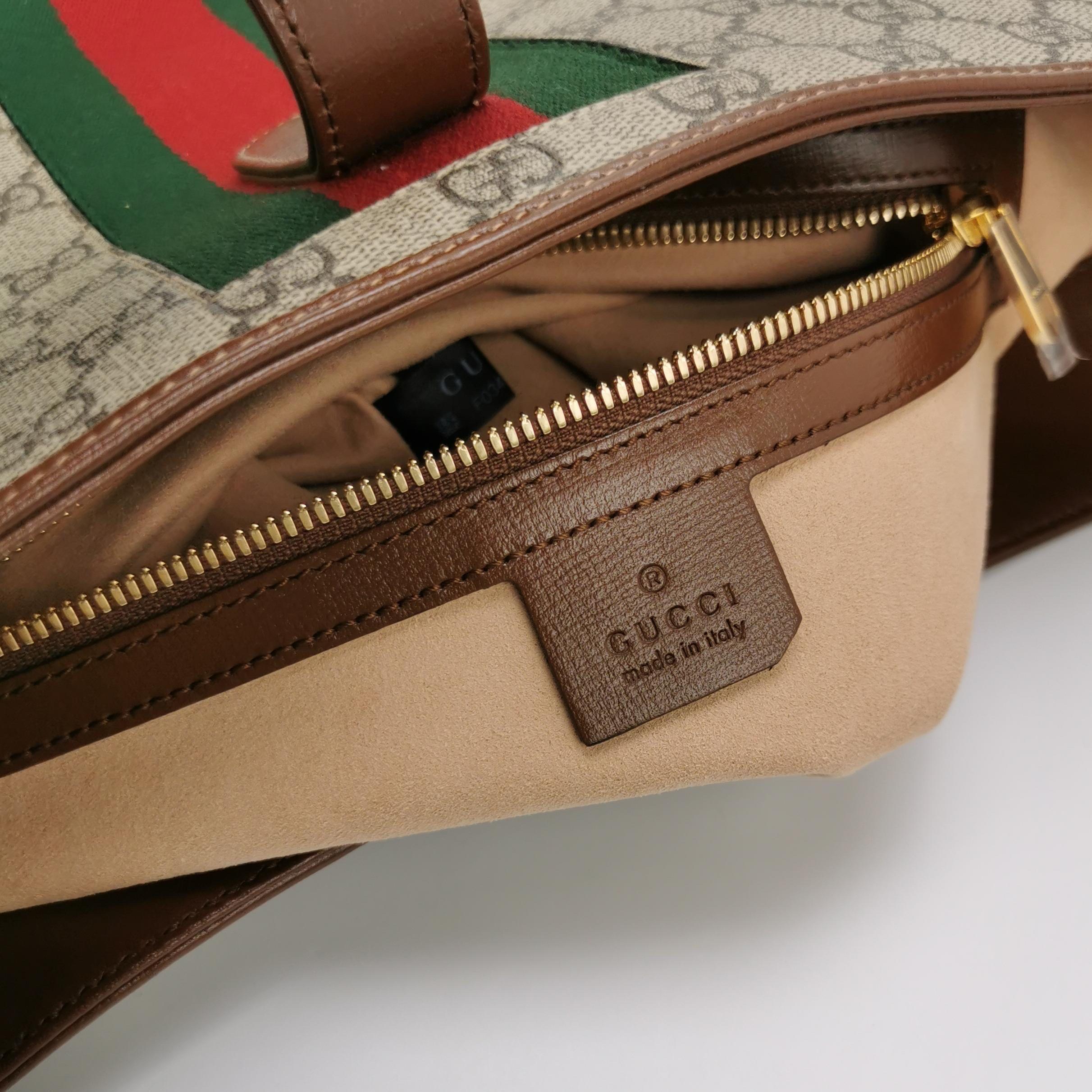 Gucci Jackie 1961 Large toile en cuir marron et Monogramme avec longue lanière Excellent état - En vente à AUBERVILLIERS, FR