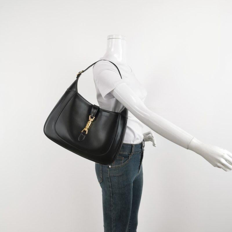 Gucci Jackie 1961 Medium Black Leather Bag with Adjustable Strap
These are professional photos of the actual bag.
  
  The Gucci Jackie 1961 Black bag is a modern take on an iconic design. Crafted in leather with a structured silhouette, it features