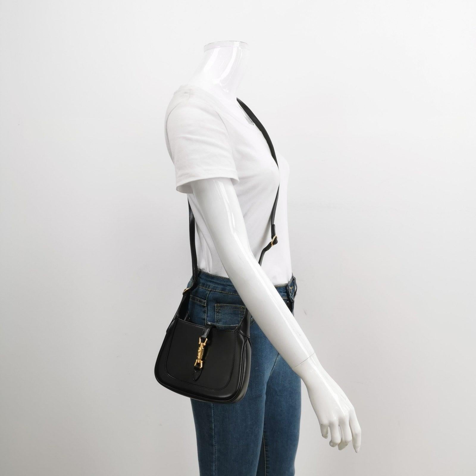 Gucci Jackie 1961 Mini Black Leather Bag with Adjustable Strap
These are professional photos of the actual bag.
  Gucci Jackie 1961 Mini size in black Leather Bag with adjustable Strap. This mini bag is perfectly petite, but packs a style punch with