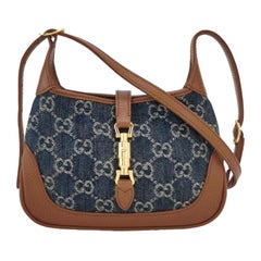 Mini bolso Gucci Jackie 1961 en tejido vaquero monograma azul y piel marrón