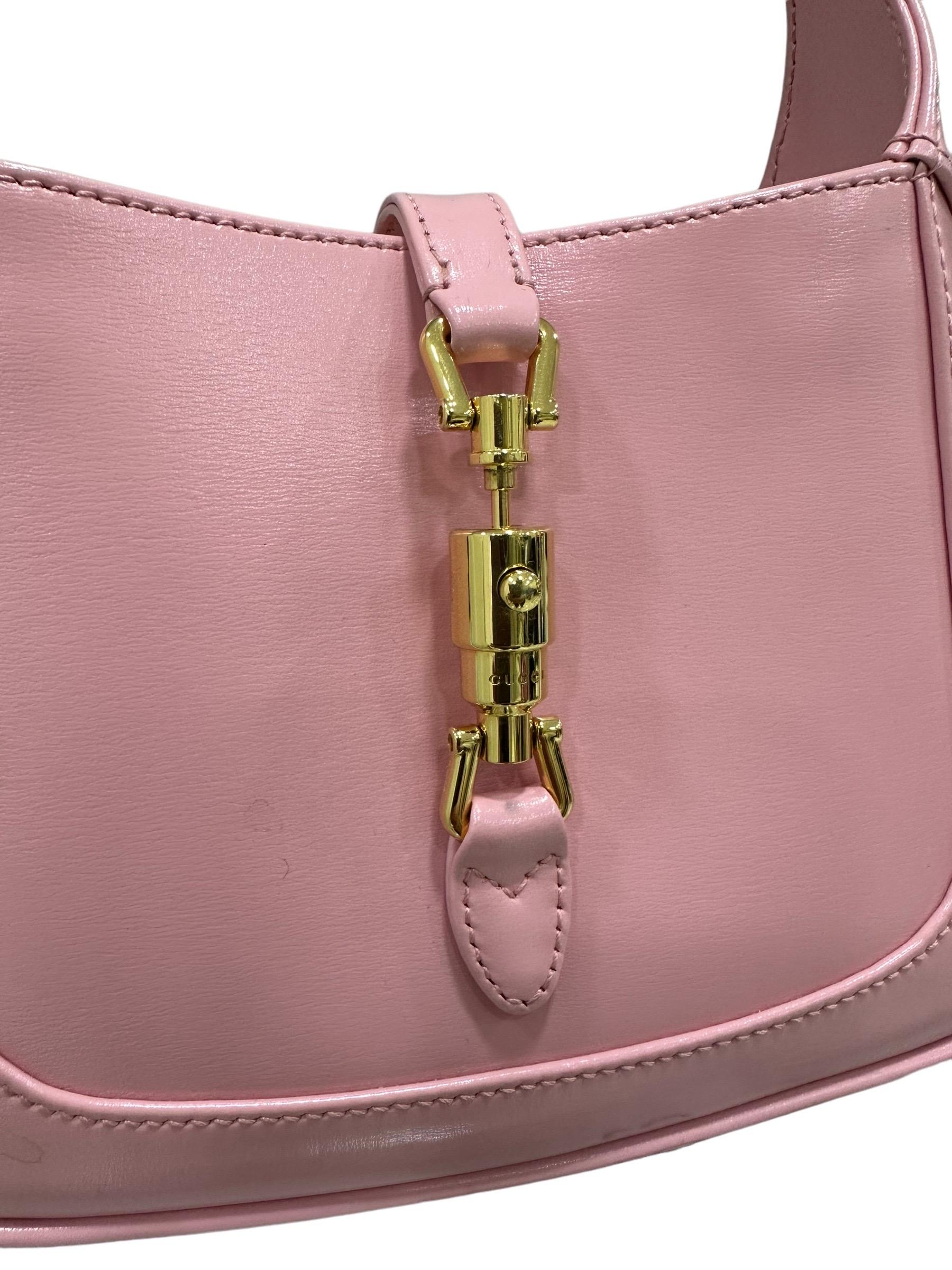 Bag signed Gucci, model Jackie 1961, size Mini, made in pink smooth leather with golden hardware. Equipped with a closure with a small central band with interlocking closure, internally lined in smooth beige leather, roomy for the essentials.