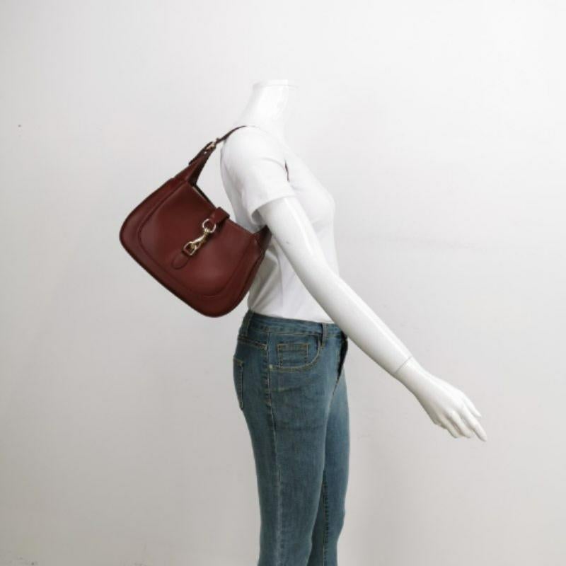 Gucci Jackie 1961 Small Ancora Red Burgundy Leather Shoulder Bag S24
 These are professional photos of the actual bag.
 
 The newest edition of the iconic Gucci Jackie 1961, crafted from high quality leather in a structured silhouette, furnished