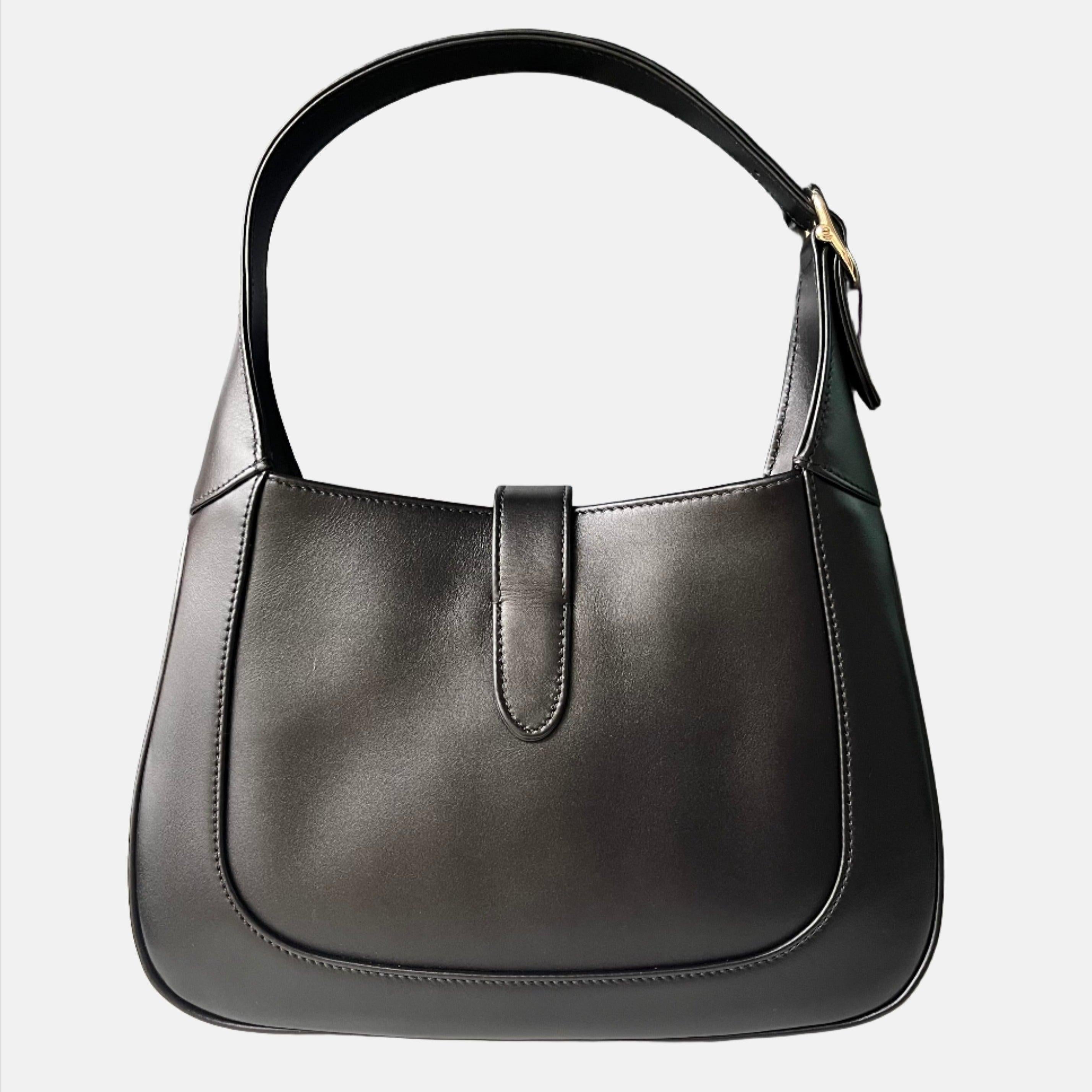 Gucci Jackie 1961 Small Black Leather Shoulder Bag Clasp S24 These are professional photos of the actual bag. The newest edition of the iconic Gucci Jackie 1961, crafted from high quality black leather in a structured silhouette, furnished with the