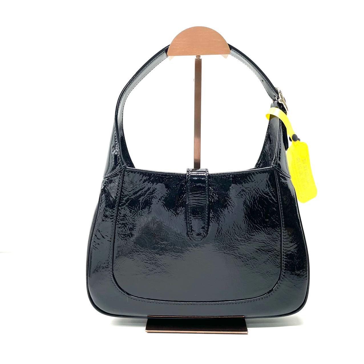 Gucci Jackie 1961 Small Black Patent Leather Shoulder Bag S24
  These are professional photos of the actual bag offered by Luxbags.
  
  The iconic Gucci Jackie 1961 has a make-over. Crafted from high quality patent leather in a structured