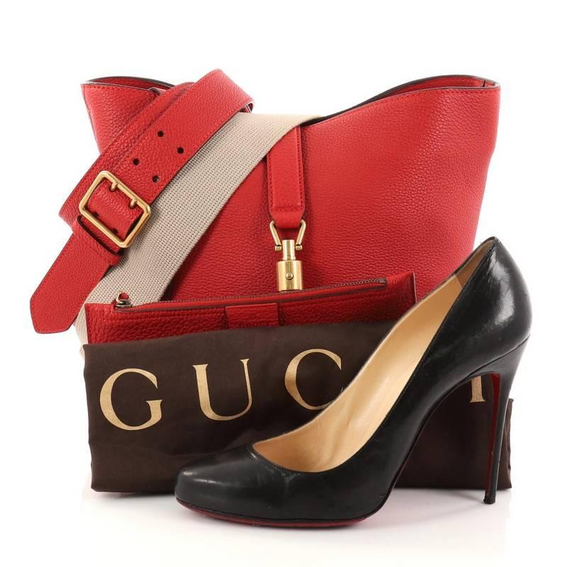 This authentic Gucci Jackie Soft Bucket Bag Leather is a must-have luxurious everyday bag fit for the modern woman. Constructed from red leather, this fresh take on the classic Jackie bag features protective base tabs and gold-tone hardware accents.
