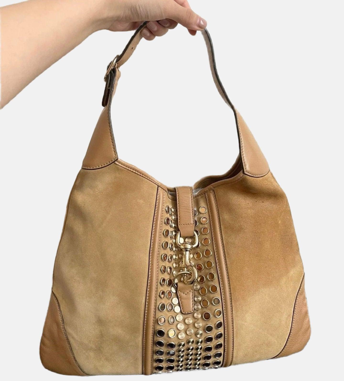 Gucci Jackie Vintage Medium Tan Brown Suede Leather Gold Hardware
 These are professional photos of the actual bag offered by Luxbags.
 CONDITION: VERY GOOD 
 This preloved Gucci item is in very good condition with light stains. light scratches on