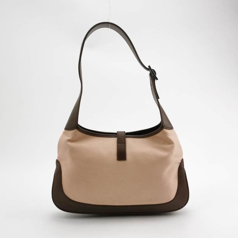 Gucci Jackie Vintage Small Brown Leather and Fabric Silver Hardware
  These are professional photos of the actual bag offered by Luxbags.
  
  CONDITION: VERY GOOD 
  This preloved Gucci item is in very good condition with light signs of wear on the