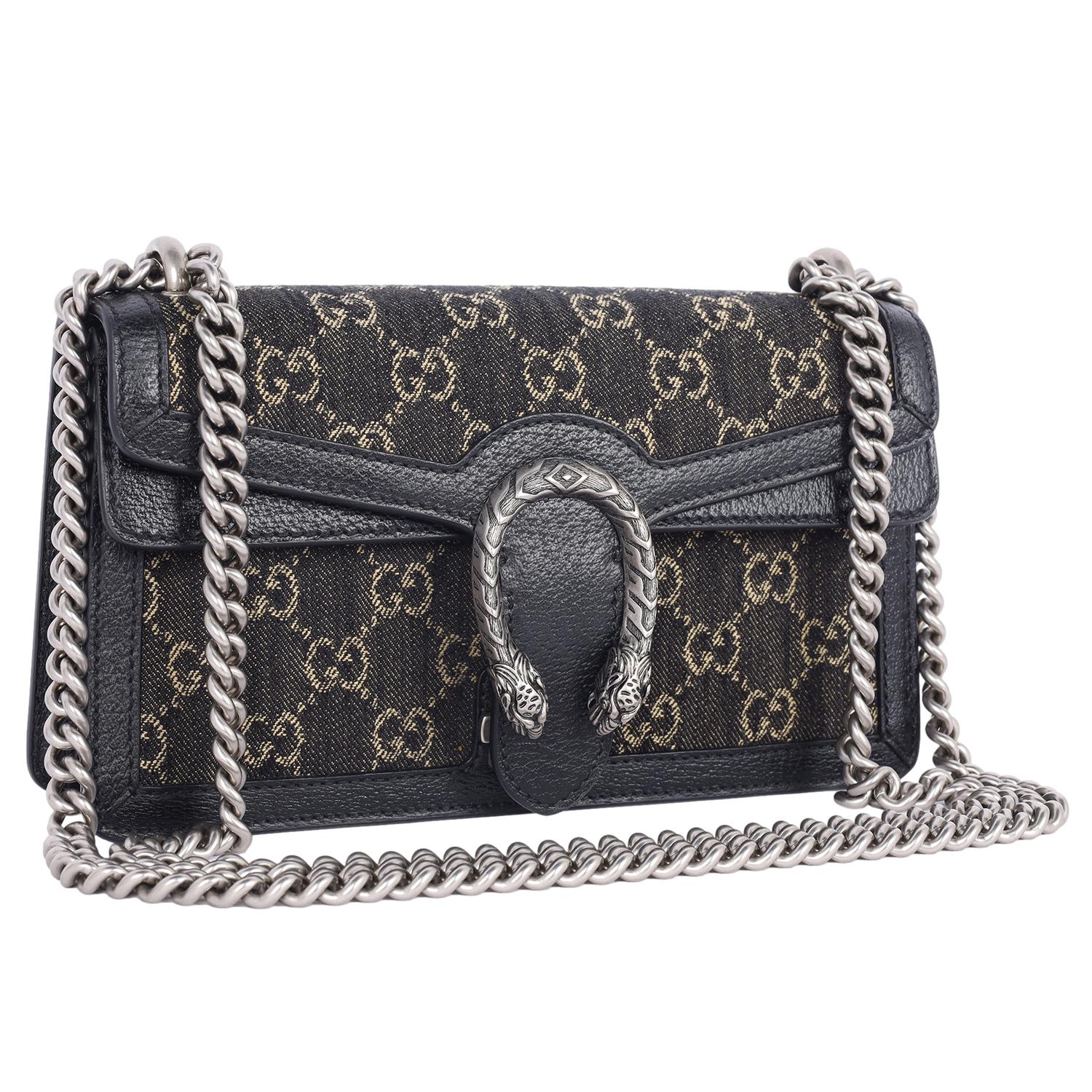 Bolso de hombro Dionysus auténtico y usado de Gucci Jacquard Negro Denim GG Monograma Dólar Texturizado Piel de Becerro. Este elegante bolso presenta el monograma de Gucci en tejido vaquero jacquard negro con logotipos GG en beige, correa para el