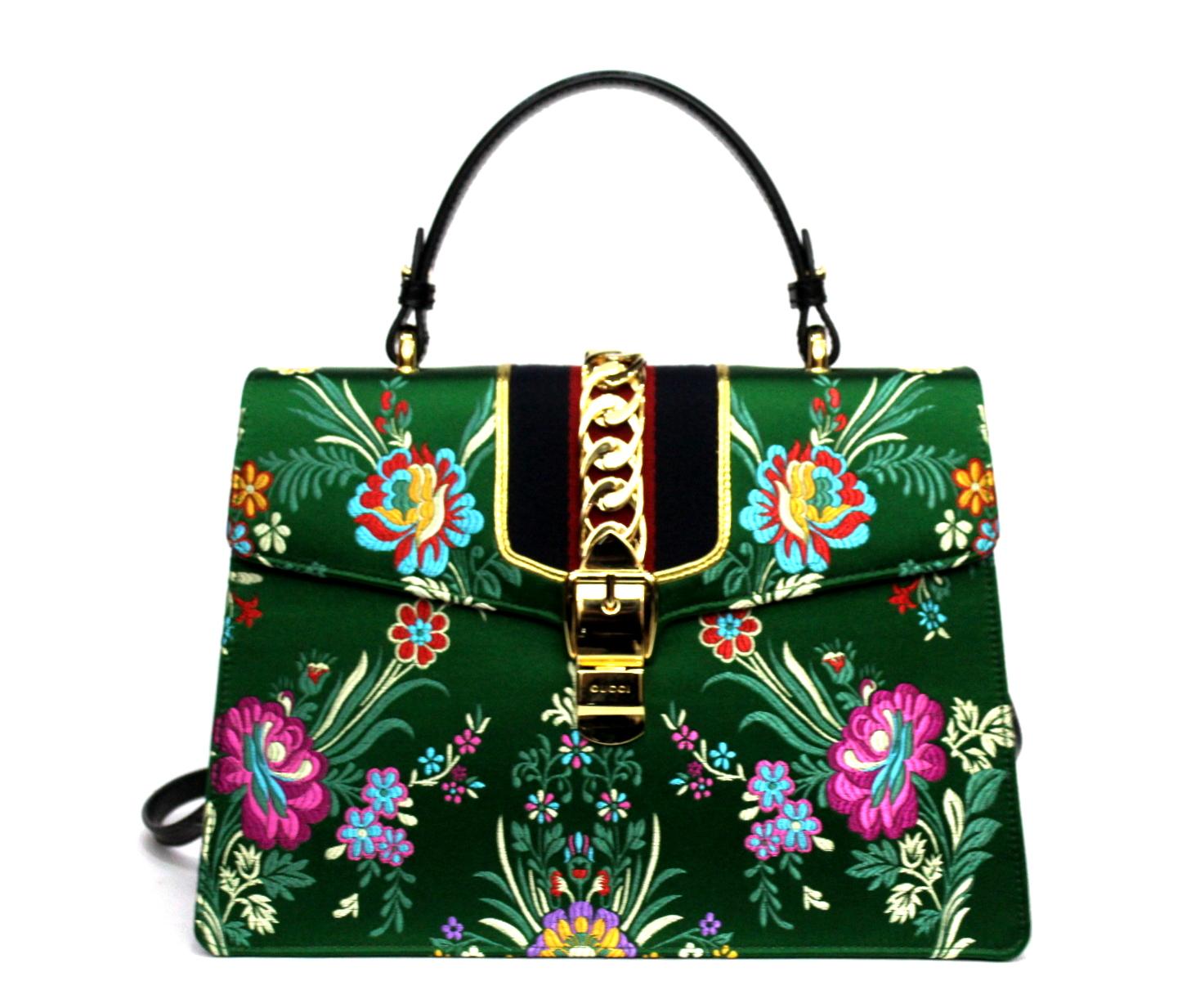 Gucci bag Sylvie model made of jacquard fabric with floral pattern.