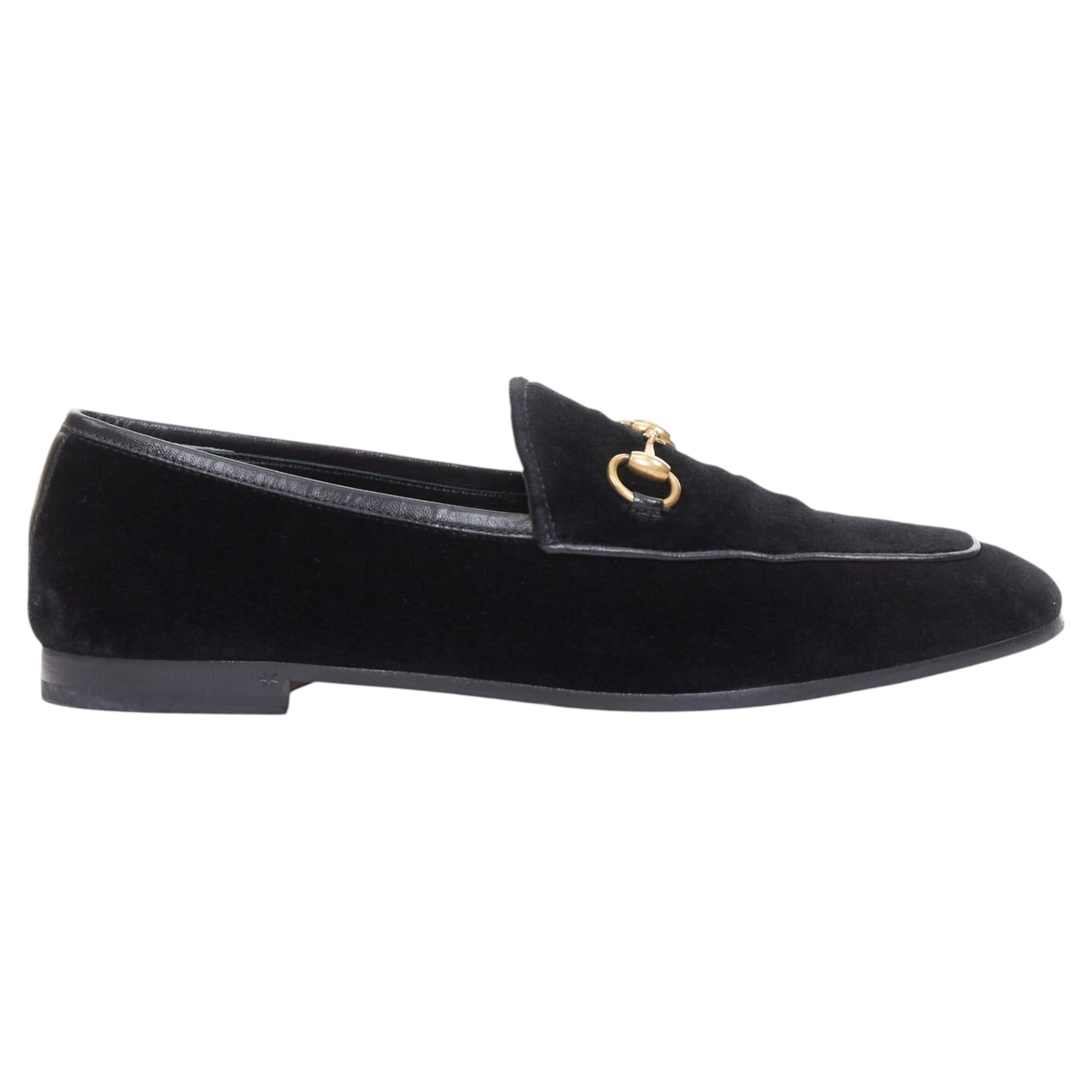 Mocasines GUCCI Jordaan de terciopelo negro con hebillas doradas en forma de herradura y ribetes de piel, talla 37,5