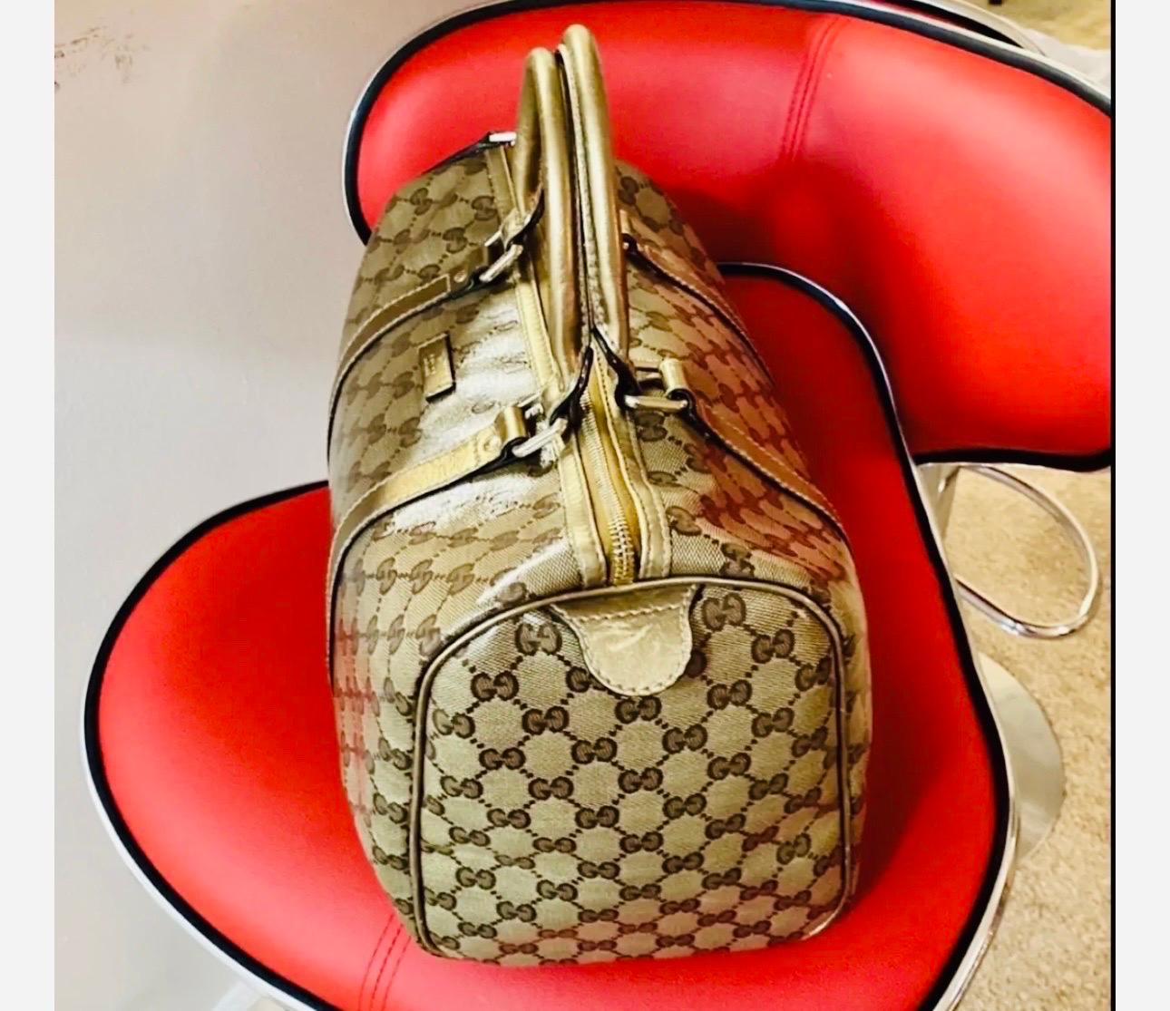 Gucci Joy Boston Bag GG Imprime Medium in Excellent condition like New
Type: Top Handle, Tote
Color: Brown with Golden/ Bronze stripes
Material: GG Monogram coated canvas
Includes: Gucci dust bag
Designer Haven ID: 19360B
Details: 
Measurements: