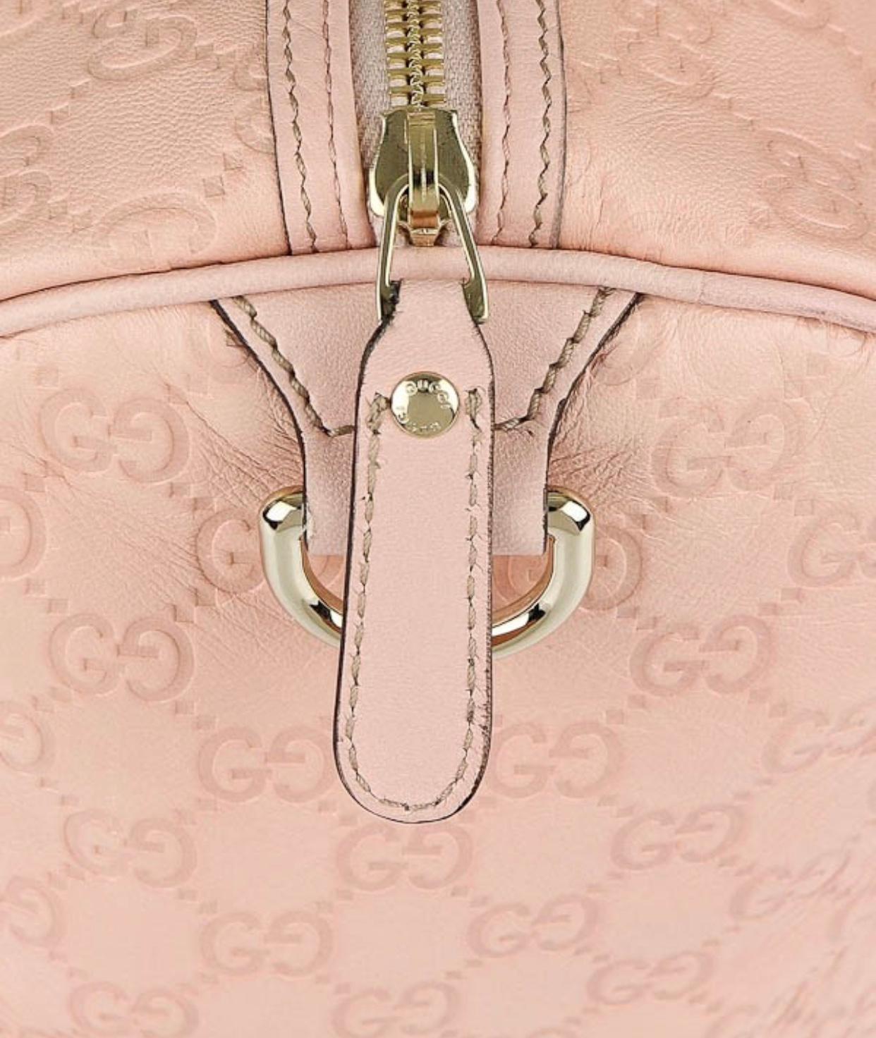 This Is An Authentic, Pre-Owned Piece but looks like brand New. Its in Excellent condition .
The Gucci Rose / Pink Guccissima Leather Medium Joy Bag is big enough for all that we need to carry. The sleek bag features soft and supple Rose Guccissima