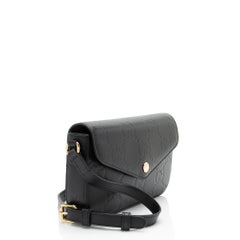 Gucci Jumbo GG Leather Mini Pochette
