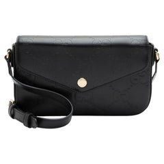 Gucci Jumbo GG Leather Mini Pochette