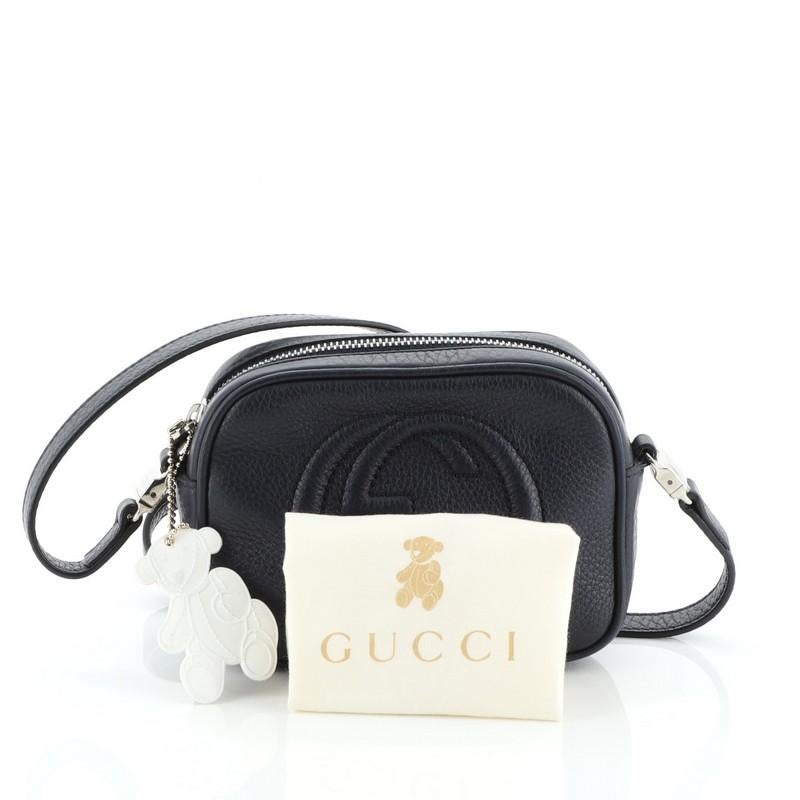 This Gucci Kid's Soho Disco Crossbody Bag Leather Mini, crafted from blue leather, features stitched interlocking GG logo on the front, leather tassel, long comfortable adjustable strap and silver-tone hardware. Its top zip closure opens to a