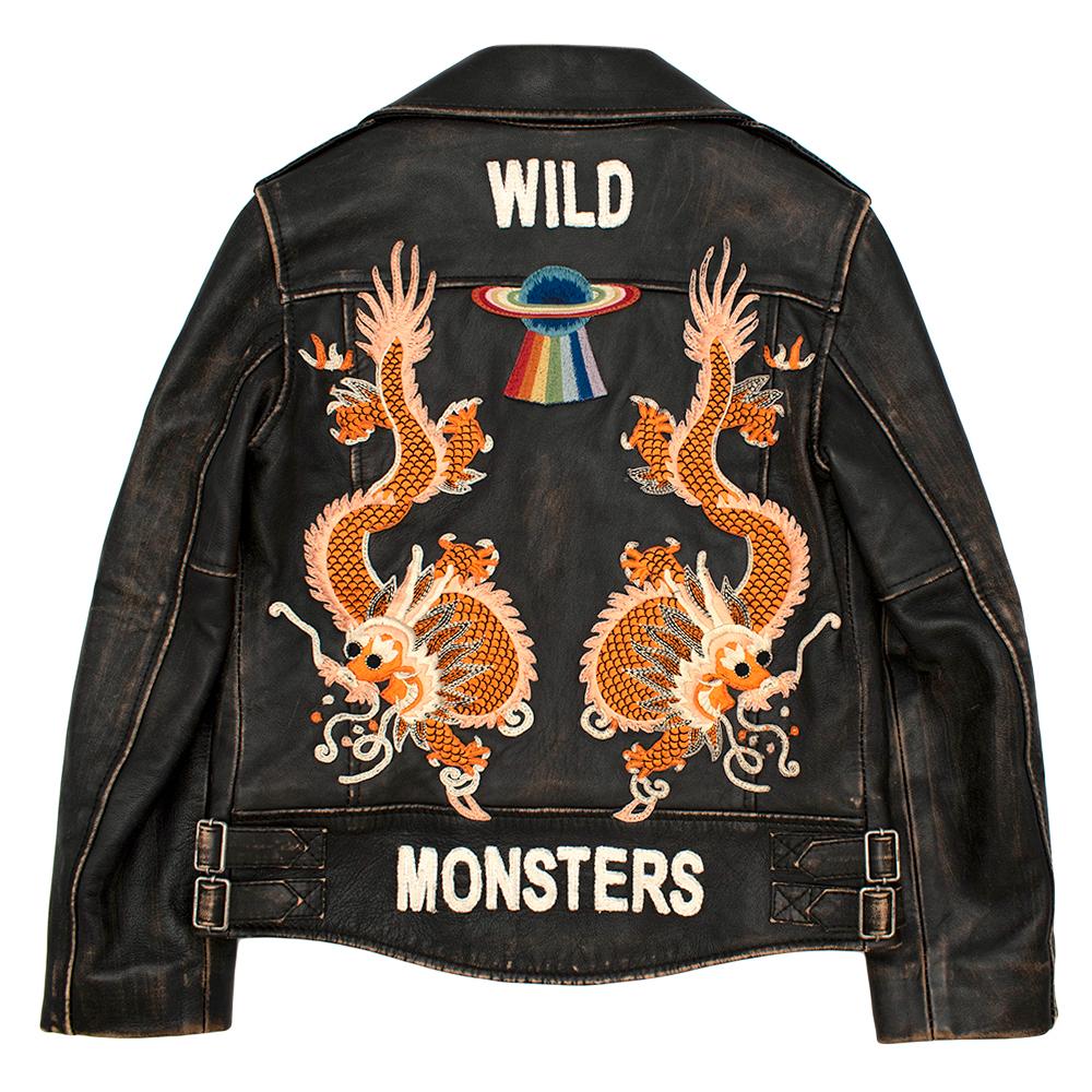 Gucci Kids Leather Embroidered Jacket 

- Distressed Leather Effect 
- 'Wild Monsters' Stitching Design 
- Side Buckle Adjusters And Cuff Zip Closure 
- Three Front Pockets
- Zip Fastening 
- Fully Lined

Material:
- 100% Lamb Leather 
- 100% Silk