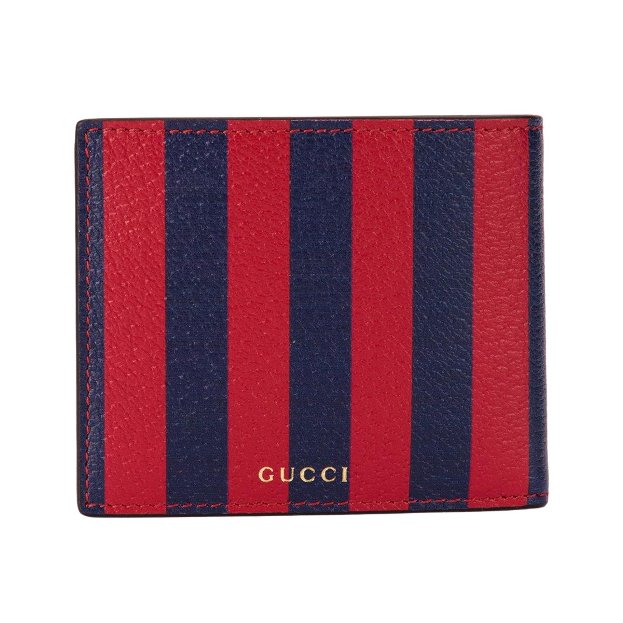 This red and dark blue canvas and leather Kingsnake print striped wallet features a striped print, interior card slots, a billfold compartment, an embossed internal logo stamp, Kingsnake printed logo at the front and a gold-tone 'Gucci' logo at the