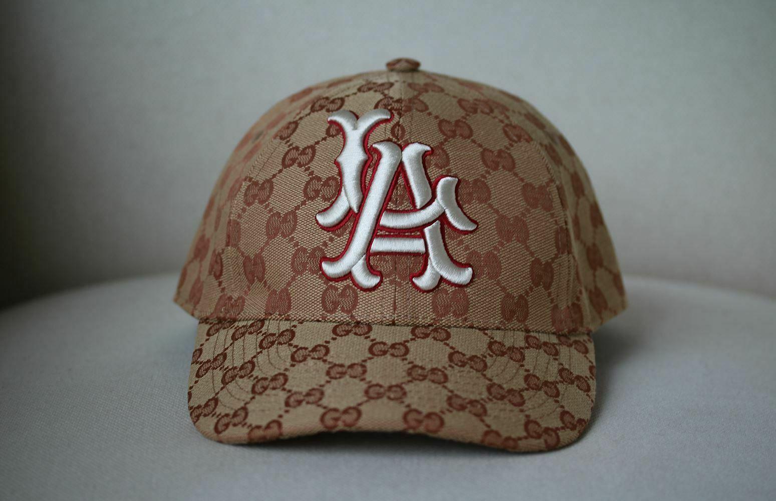 Inspired by the Creative Director's New York Yankees baseball hat, Gucci incorporated a mix of Major League Baseball teams into the Fall Winter 2018 Fashion Show collection. The Los Angeles Angels patch decorates a baseball cap in Original GG canvas