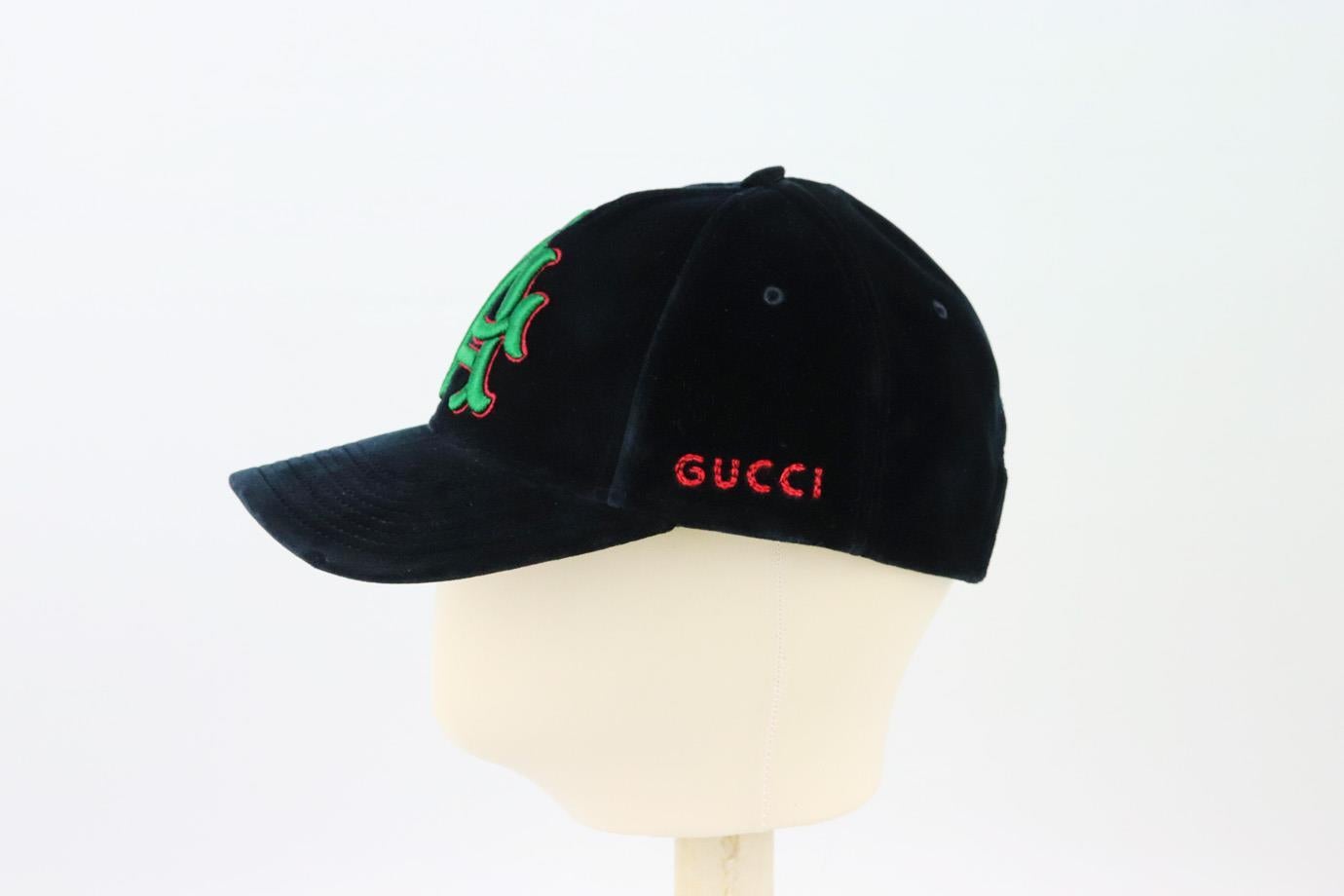 This baseball cap by Gucci is perfect for dressing down a more polished look, this LA Angels style is made from structured cotton-velvet and embroidered with one of the brand's emblem at the front. Navy velvet. Buckle fastening at back. 100% Cotton;