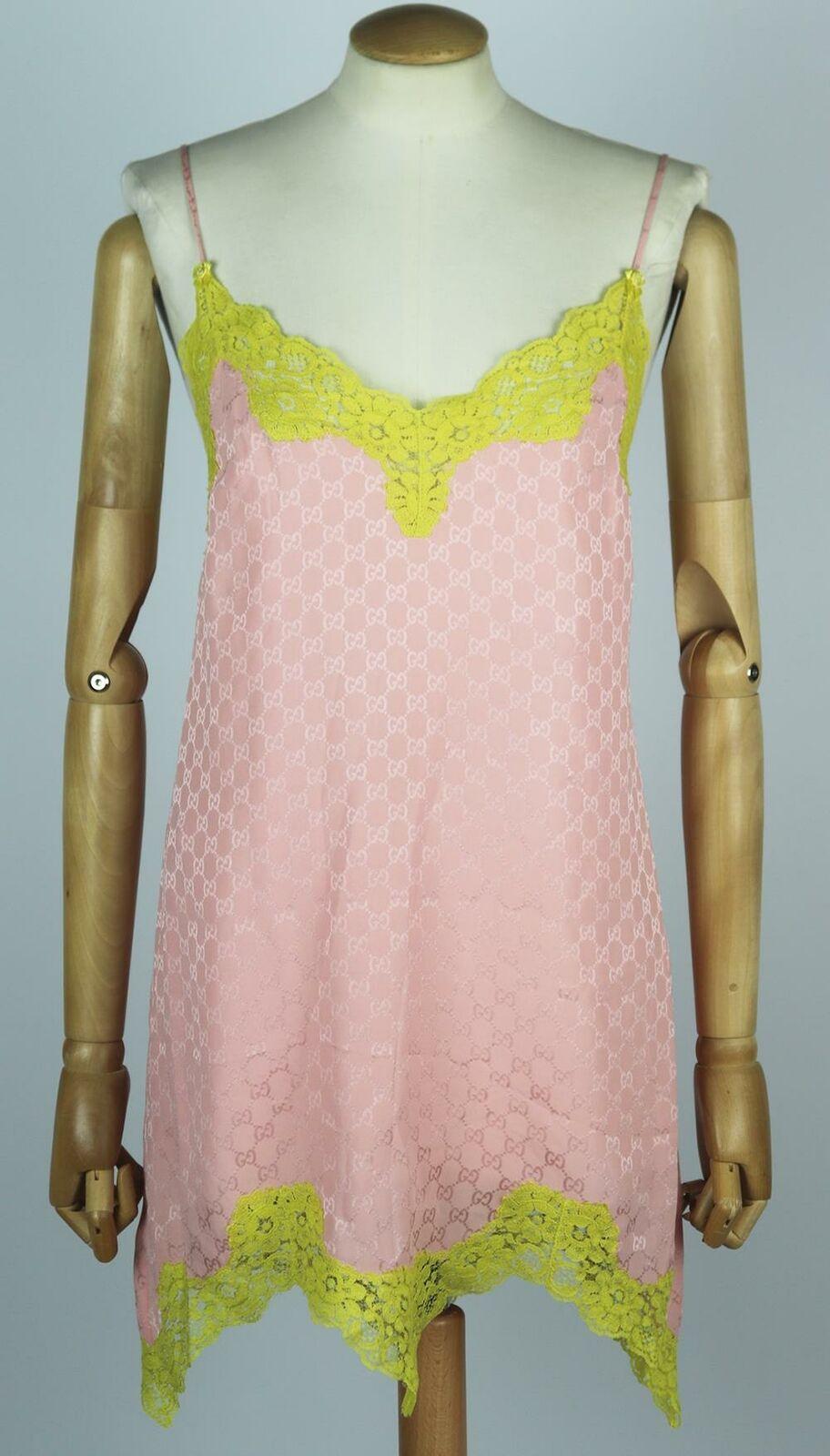 Gucci's Resort '20 collection is filled with lingerie-inspired pieces, like this mini dress, cut from luxurious silk that's embroidered with the house's iconic 'GG' monogram, it has dainty lace trim and pin-thin shoulder straps
Pink silk, yellow