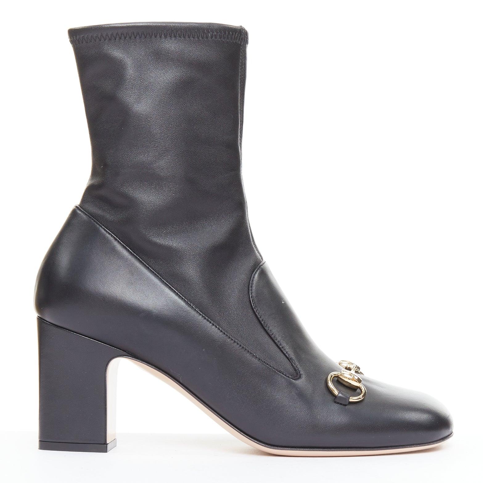 GUCCI Lady Horsebit 80 gold buckle black round toe stretch boots EU38
Reference: AAWC/A01502
Brand: Gucci
Designer: Alessandro Michele
Model: Lady Horsebit 80
Material: Leather
Color: Black, Gold
Pattern: Solid
Closure: Zip
Lining: Black