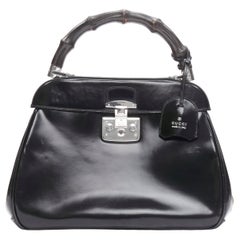 GUCCI Lady Lock black smooth leather Bamboo handle lock satchel bag