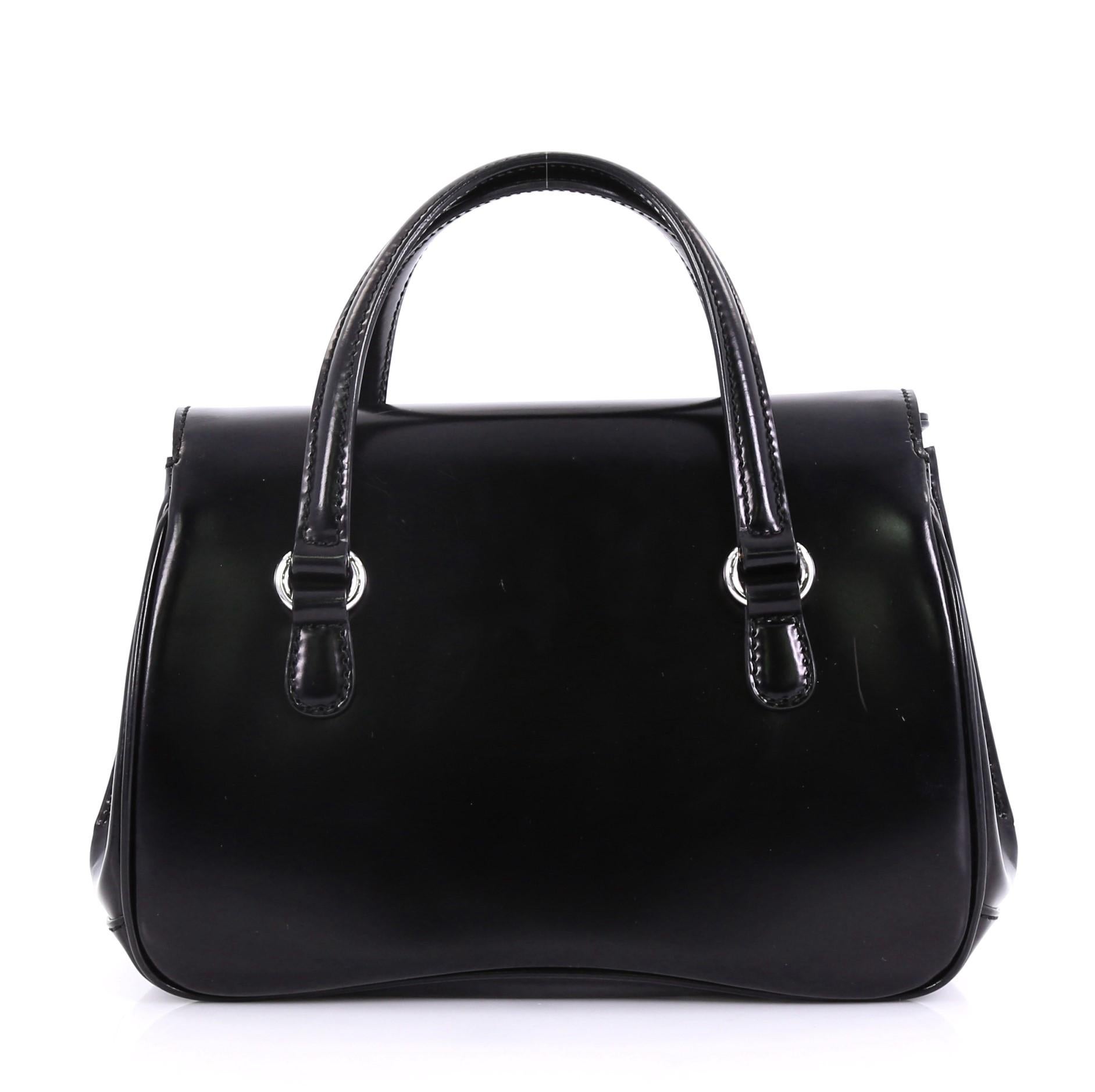 Gucci Lady Lock Satchel Leather Small, crafted in black glazed leather In Good Condition In NY, NY
