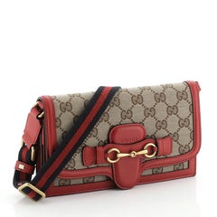 Gucci Lady Web Convertible Wallet GG Canvas mit Leder