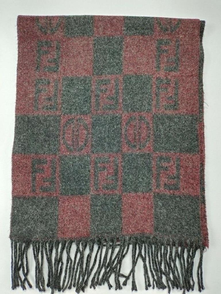  VERY GOOD CONDITION
(8/10 or AB)

Genuine FENDI scarf (premium used scarves)

Measurement: Length 62 Inch * Width 11 Inch

Colour: Grey / Maroon
