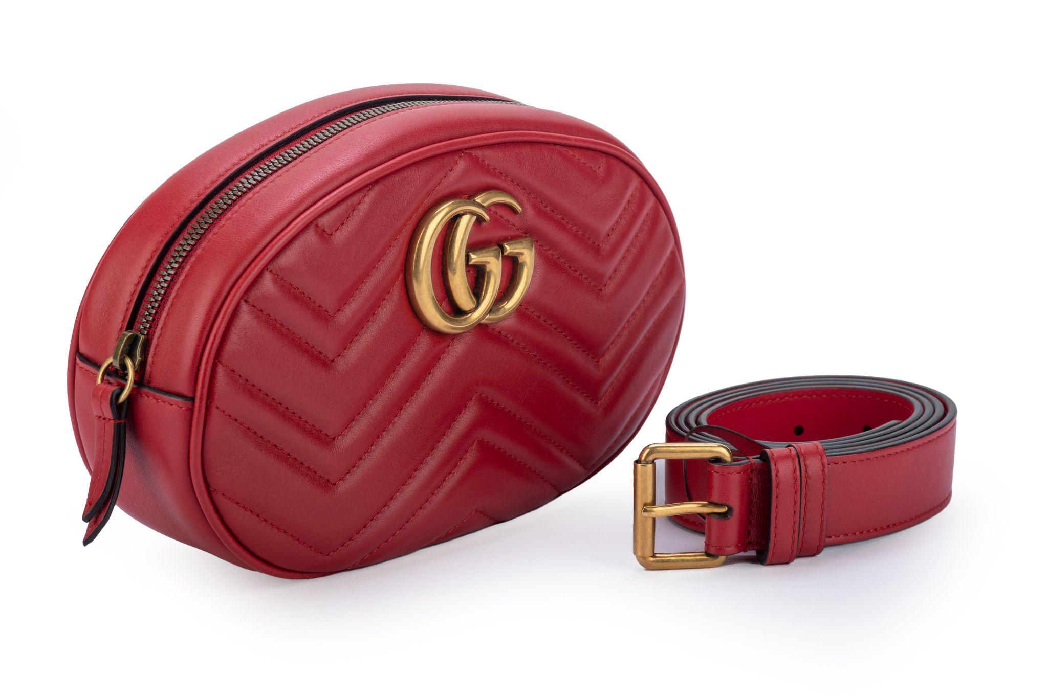 Gucci brand new red quilted leather marmont fanny pack with GG gold logo. Adjustable belt up to 41