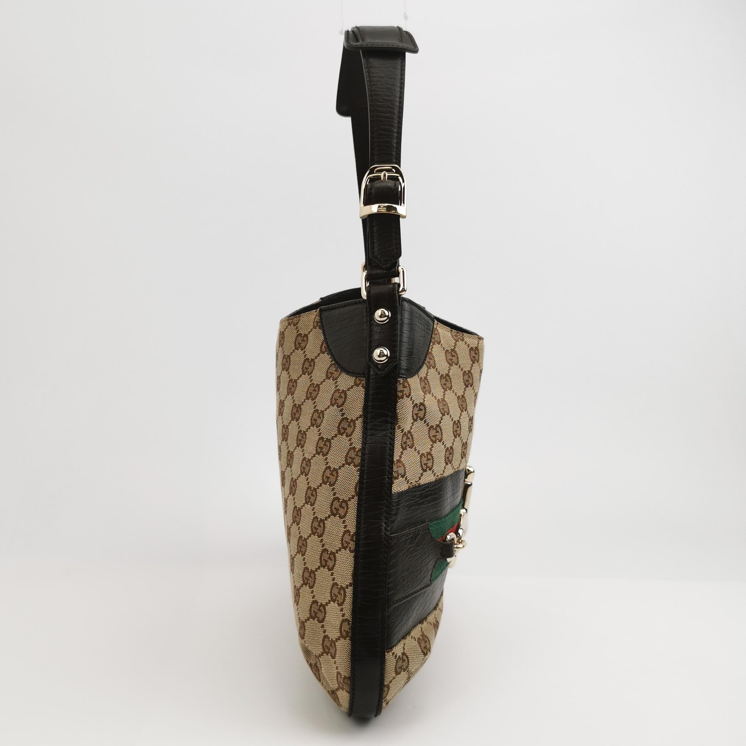 Bolso de hombro grande vintage marrón con monograma y herradura lateral de cuero de Gucci en Bueno estado para la venta en AUBERVILLIERS, FR