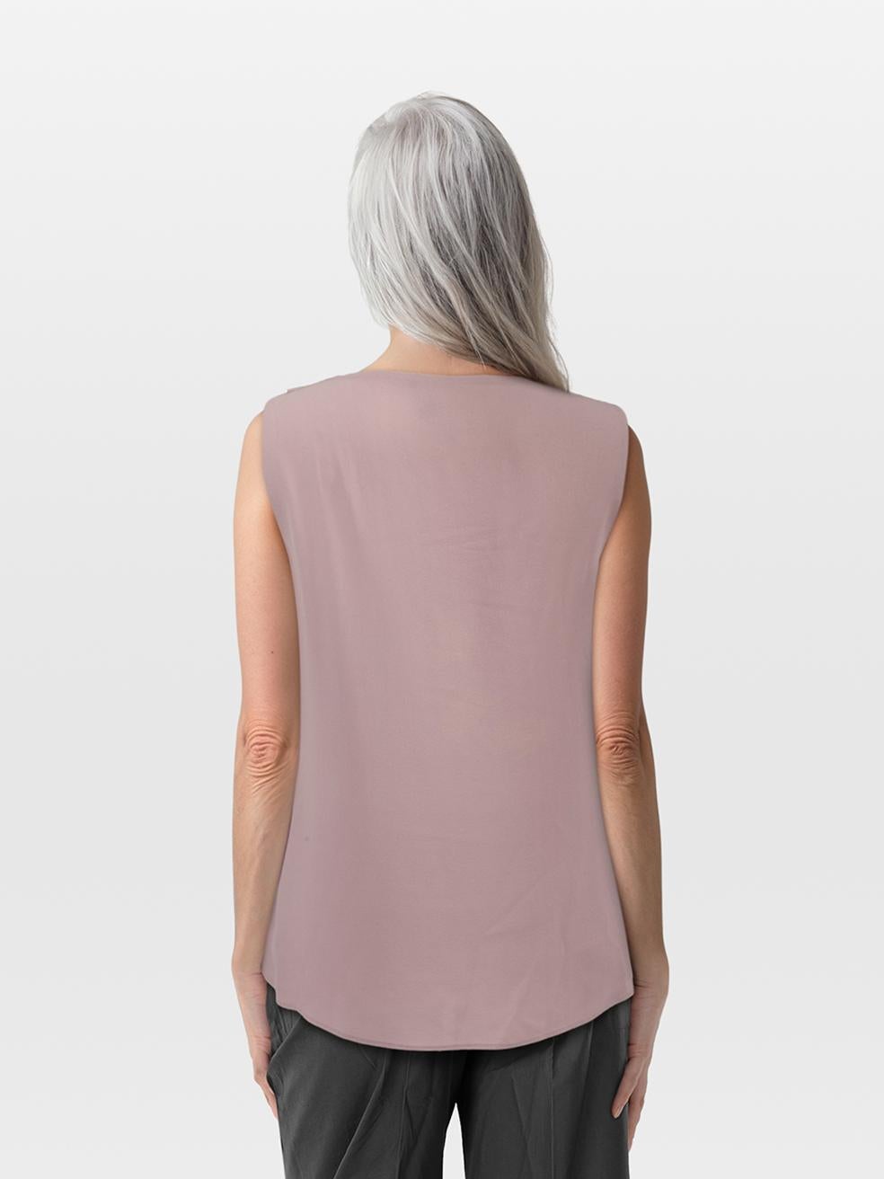 CONDITION is Very good. Minimal wear to the top is evident. Discolouration on the front and back. Loose corner on the back neck designer label on this used Gucci designer resale item. Discolouration may need gentle hand wash contrary to dry clean