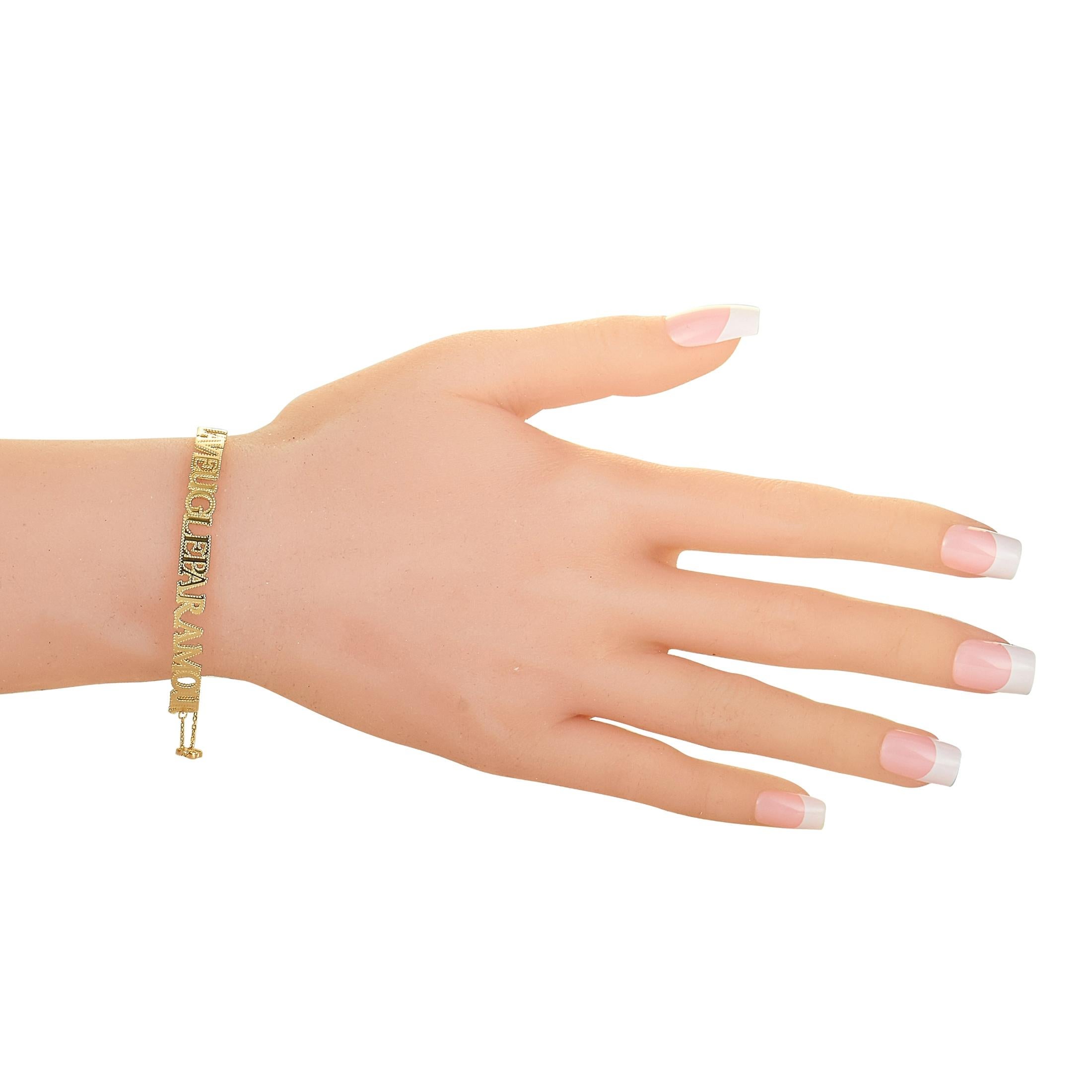 The Gucci “L'Aveugle Par Amour” bracelet is crafted from 18K yellow gold and weighs 10 grams, measuring 7” in length.
 
 The bracelet is offered in brand new condition and includes the manufacturer’s box and papers.