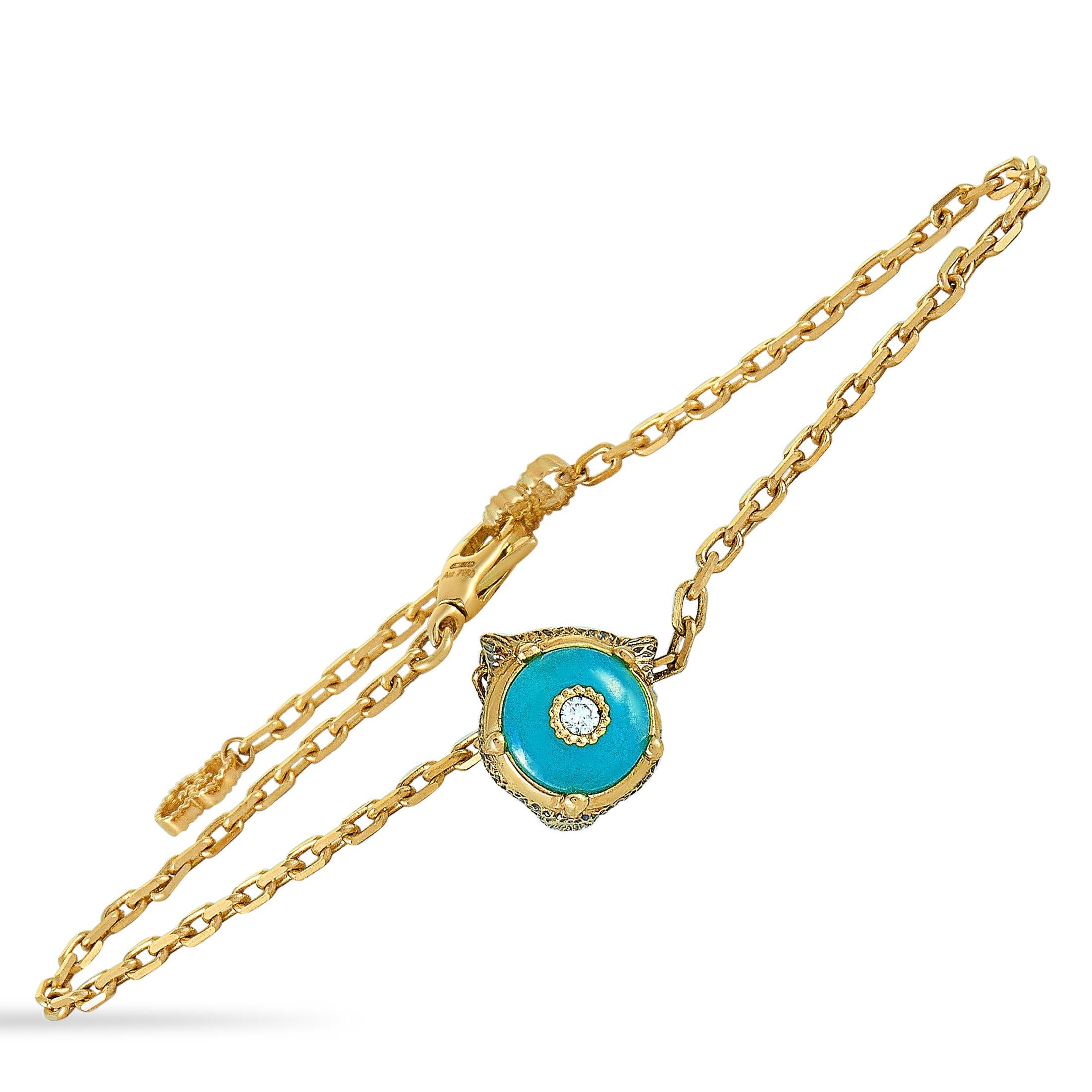 The Gucci “Le Marché des Merveilles” bracelet is crafted from 18K yellow gold and set with a turquoise and three diamond stones. The turquoise weighs approximately 1.15 carats and the diamonds boast GH color and VVS clarity and amount to