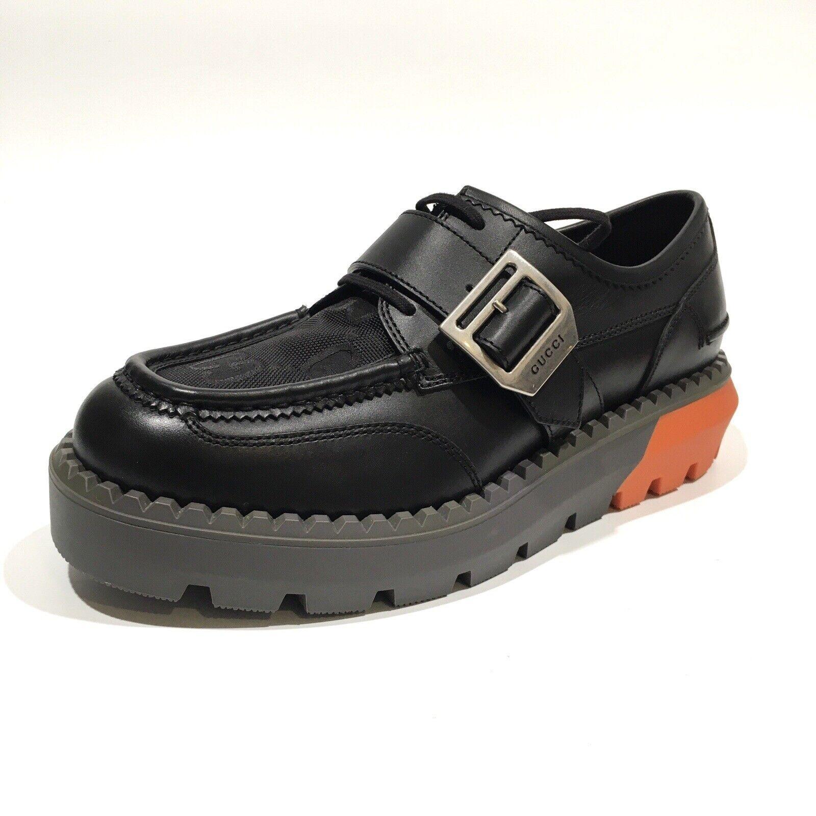 GUCCI LEATHER BLACK ORANGE LACE UP BUCKLE LOAFERS

Color: black
Material: leather with shiny patent finish
Model No. 739868 AABZO 1000

Size: US 9.5  EU 42.5
Platform Height: 38 mm / 1.5” 
Condition: New
Comes with: dust bag & shoes
