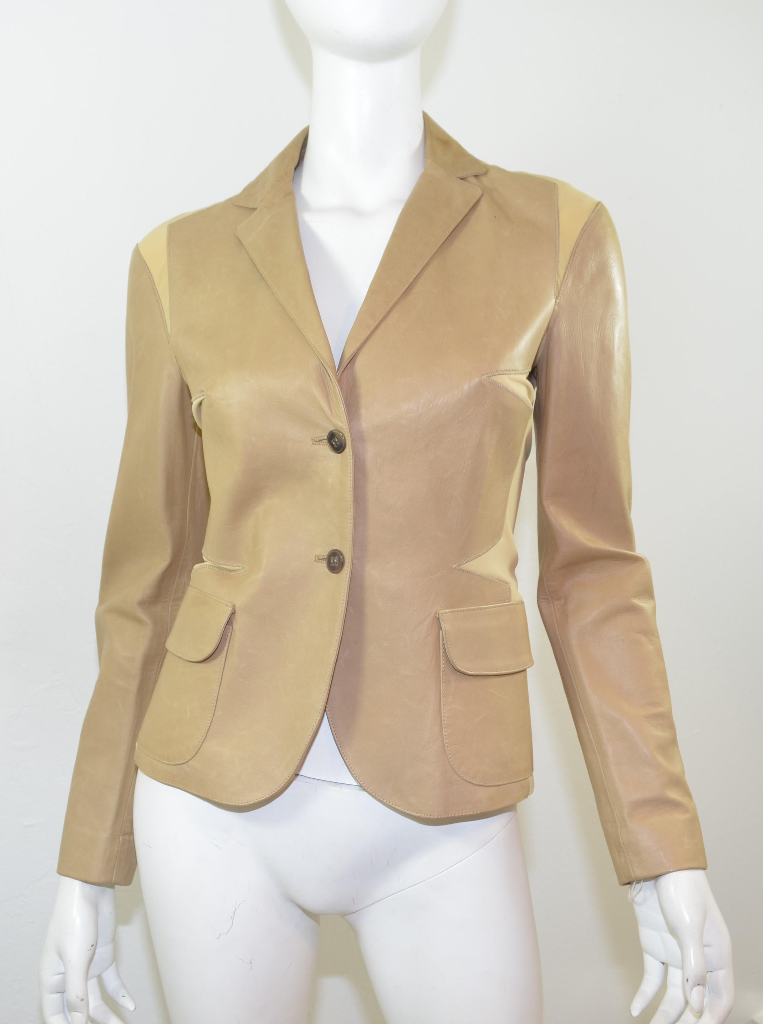 Gucci blazer jacket featured in a tan color with genuine leather and mesh panels along the bodice and elbows. Blazer has button fastenings at the front and on the cuffs. Size 40, made in Italy. 

Bust 34''
Length 24''
Sleeves 24''