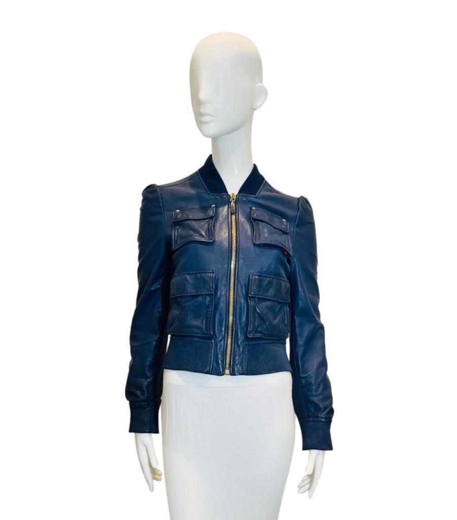 Gucci Leather Bomber Jacket

Navy jacket designed with four flap pockets to the front and ribbed collar, cuffs and hem.

Detailed with gold star embellishments to the pockets, and zip closure to the centre.

Size – 40IT

Condition – Very Good (Minor